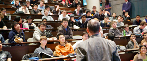 Image of students in a lecture hall.