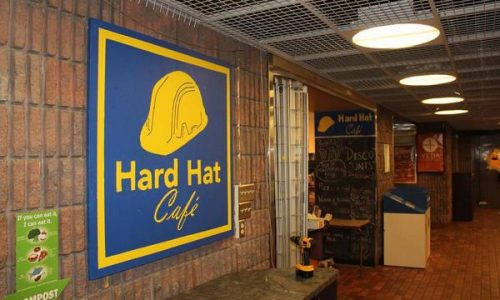 Image of the Hard Hat Café on the left and Veda on the right.