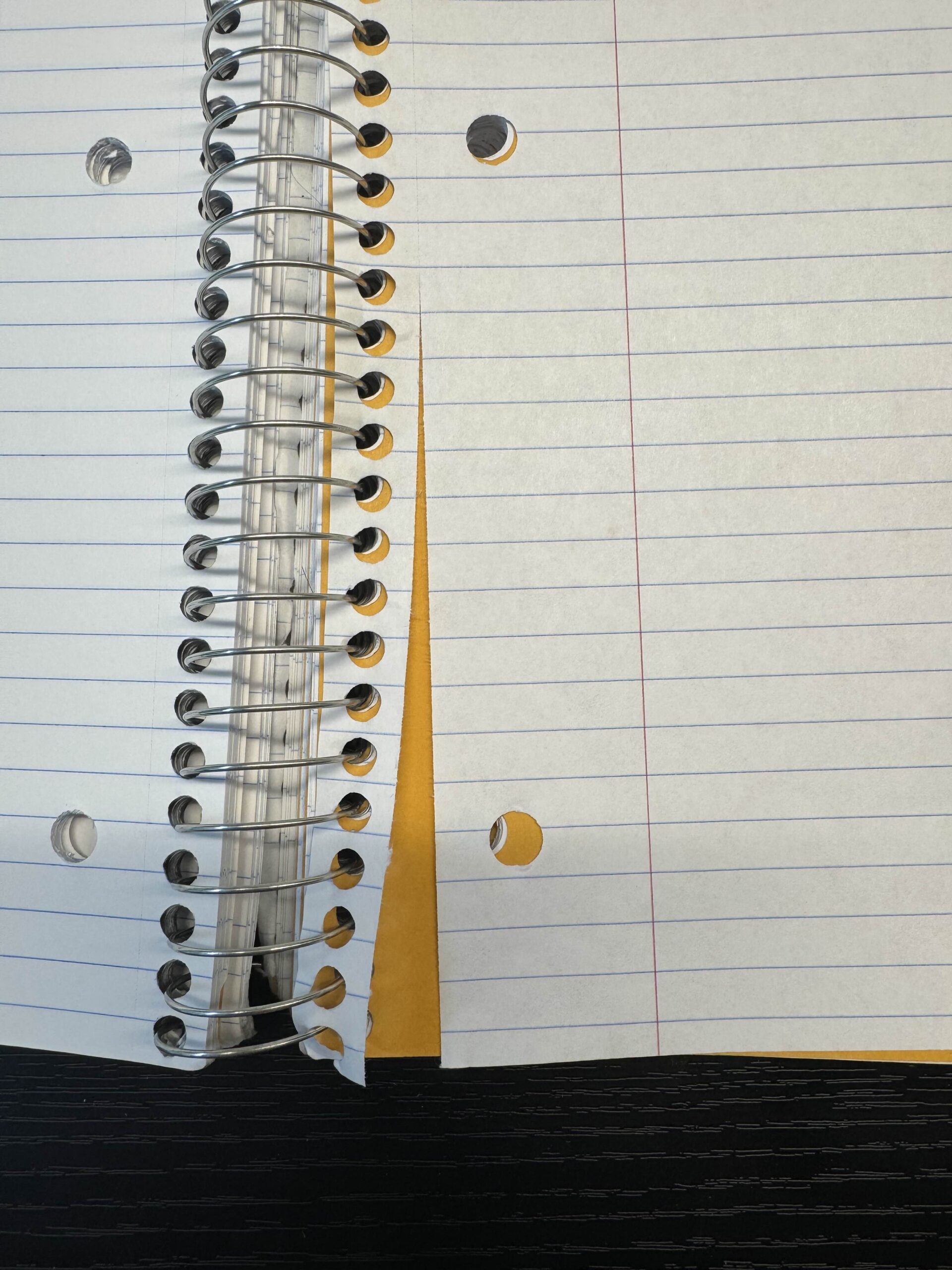 Serrated line for easy tearing in notebook